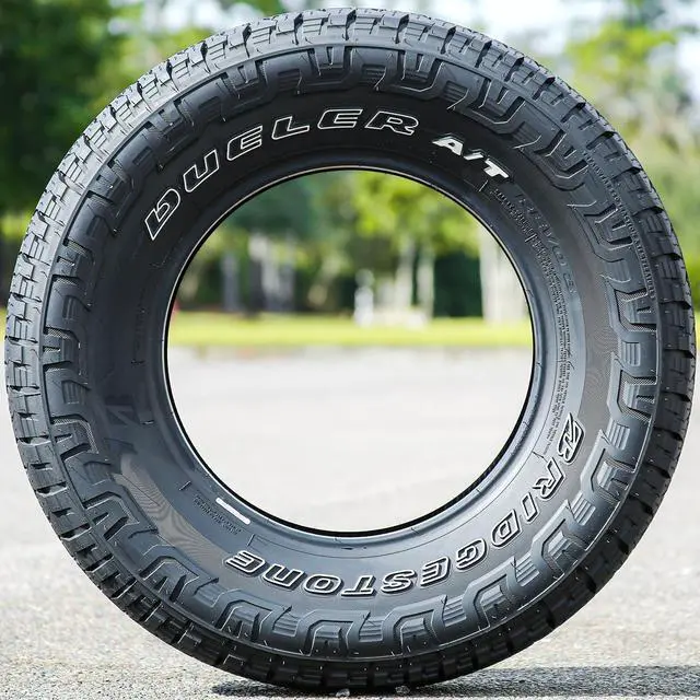 Alt view image 4 of 7 - Bridgestone Dueler A/T REVO 3 All-Terrain Tire - LT265/70R18 124/121R E (10 Ply)