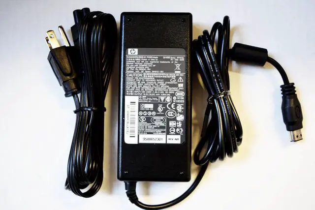Main image of Original HP Laptop AC Adapter: 18.4V/4.9A 90W Oval Connector 12.4 x 6.7mm. Series: PPP012L. HP Part No. 393949-001. Replace with HP Spare 394810-001. For HP Pavilion ZV6000, Compaq Presario R4000