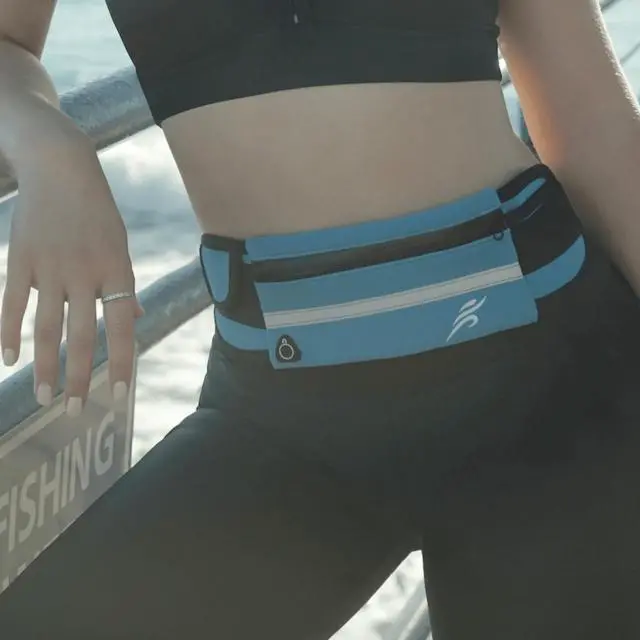 Alt view image 2 of 5 - JupiterGear Sports Running Belt and Travel Fanny Pack for Jogging, Cycling and Outdoors with Water Resistant Pockets Dark Blue