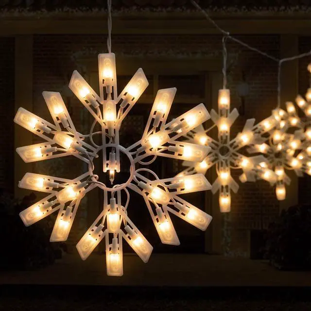 Alt view image 2 of 7 - Snowflake Christmas String Lights - 2 Pack 6 Drops 8.8 Ft. 100 Mini Bulb Snowflake Icicle Lights with Hooks Connectable Hanging Lights for Xmas Rooftop Home Indoor Outdoor Party Wedding