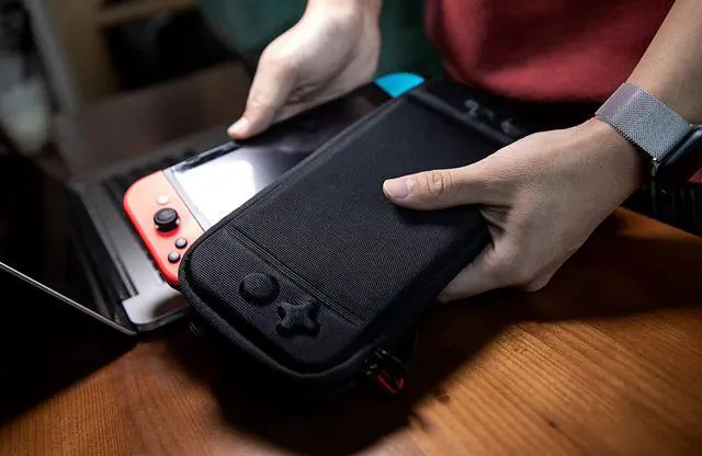 Alt view image 6 of 6 - Ultra Slim Case for Nintendo Switch Lite Original Patent Protective Portable Carrying Case Travel Storage Hard Shell with 8 Game Cartridges and Military Level Protection Gray