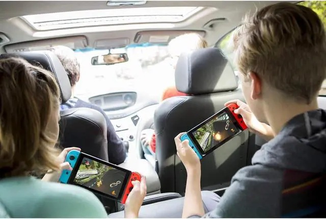 Alt view image 3 of 5 - Nintendo Switch with Mario Kart 8 Deluxe Console Bundle - Neon Blue/Red