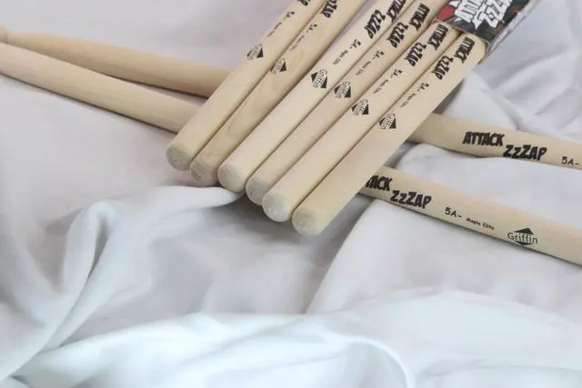 Alt view image 2 of 7 - 12 Pairs of Select Elite Maple Wood Drum Sticks by GRIFFIN Attack Zzzap - Size 5A Premium Balanced, Level and Straight - Drummers Percussion Classic Pure Grit Uncoated, Raw Wood Drumming Sticks