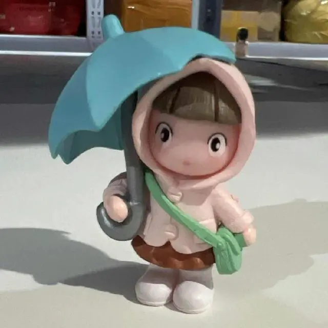 Main image of Resin Umbrella Girl Car Ornament