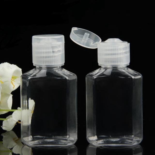 Main image of Travel Size 2 Ounce , PET Clear Plastic Empty Squeeze Bottles with Flip Cap , BPA-free, Pack of 5, safe for hand sanitizer,  hair and skin care products.
