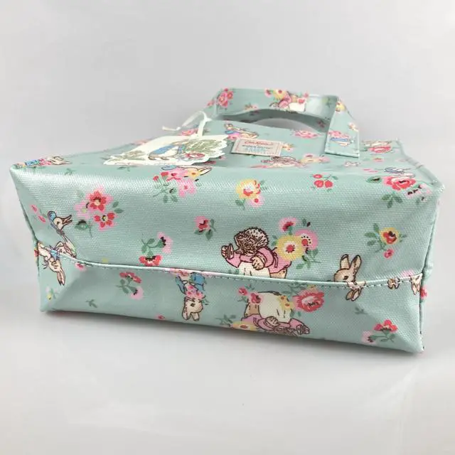 Alt view image 7 of 7 - Cath Kidston x Peter Rabbit Limited Edition Small Bookbag Open Top Handled Handbag Lunch Bag Water Resistant Oilcloth Tote Floral Pattern