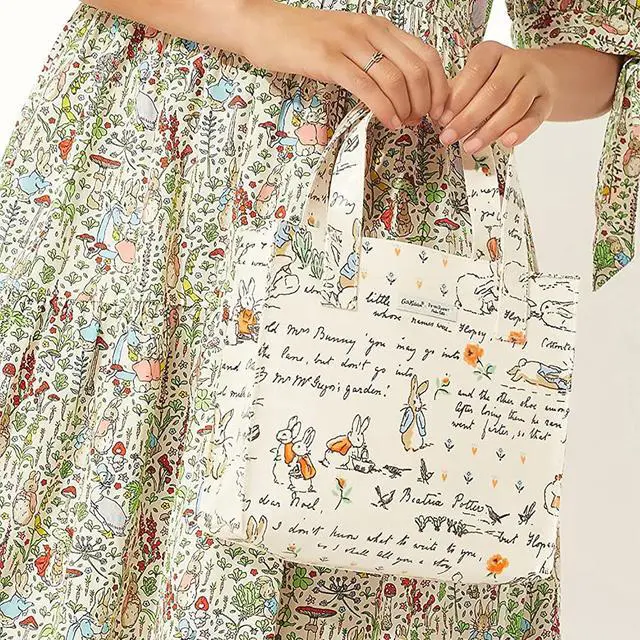 Alt view image 4 of 7 - Cath Kidston x Peter Rabbit Limited Edition Small Bookbag Open Top Handled Handbag Lunch Bag Water Resistant Oilcloth Tote Floral Pattern Cream