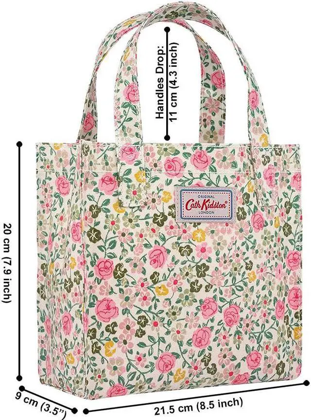 Alt view image 2 of 7 - Cath Kidston S Bookbag Small Size Open Top Handled Handbag Lunch Bag Water Resistant Oilcloth Tote Small Flowers Floral Pattern (Hedge Rose Cream Color)