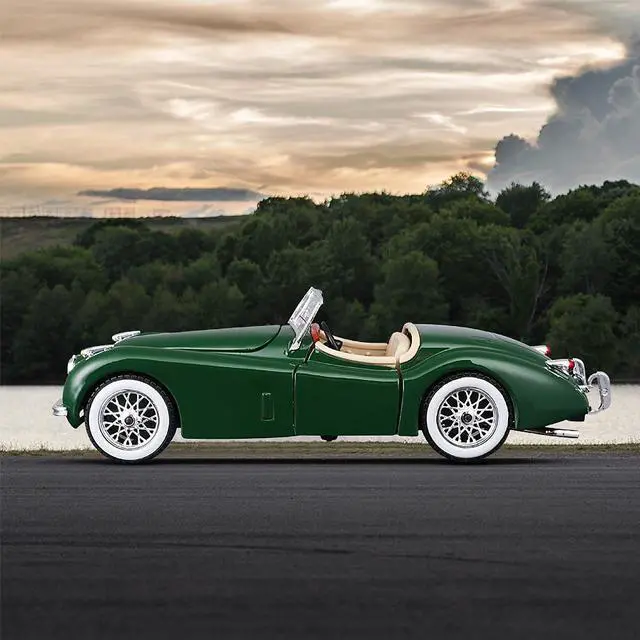 Alt view image 2 of 7 - Bburago 1:24 Scale Jaguar (1951) XK 120 Classic Roadster Car Alloy Diecast Model Star Collection Series (Color: Green)
