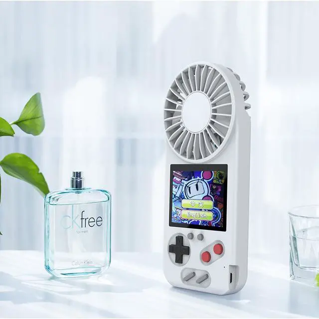 Alt view image 3 of 7 - Handheld Game Console with Fan,2 in 1 800mAh etro Video Games Console for kids with 500 Classic Games,3.0" Screen,Consola de Juegos Portátil con ventilador,for Kids and Adult