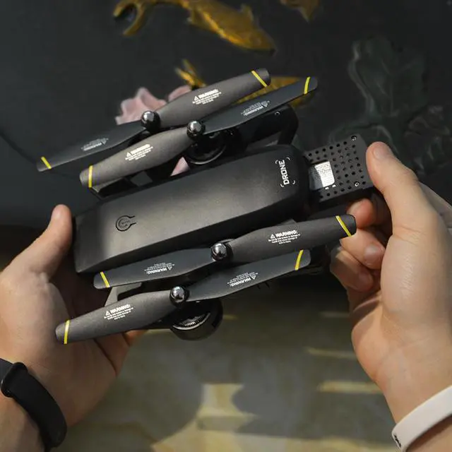Alt view image 2 of 5 - Folding high-definition professional gps long endurance drone aerial photography aircraft four-axis remote control helicopter model