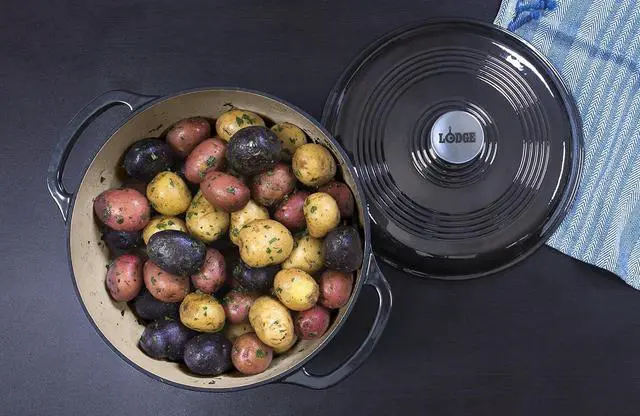 Alt view image 4 of 7 - Lodge 6 Quart Enameled Cast Iron Dutch Oven with Lid  Dual Handles  Oven Safe up to 500° F or on Stovetop - Use to Marinate, Cook, Bake, Refrigerate and Serve  Midnight Chrome