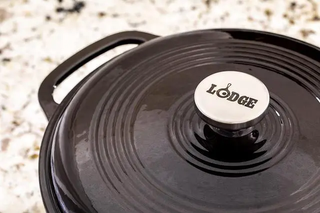 Alt view image 6 of 7 - Lodge 6 Quart Enameled Cast Iron Dutch Oven with Lid  Dual Handles  Oven Safe up to 500° F or on Stovetop - Use to Marinate, Cook, Bake, Refrigerate and Serve  Midnight Chrome