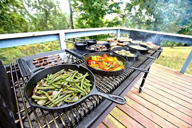Alt view image 6 of 7 - Lodge 17 Inch Pre-Seasoned Cast Iron Skillet - Dual Assist Handles - Use in the Oven, on the Stove, on the Grill, or Over a Campfire - Black