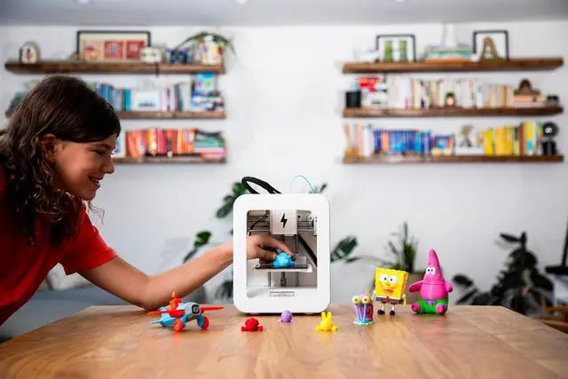 Alt view image 3 of 3 - 3D Printer for Kids, No Software Needed (Includes: 3D Printer, 8 Preselected Printer Food Rolls, Free 500+ Toy Digital Catalog, Removable Bed), Deluxe Pack (Alpha Two)