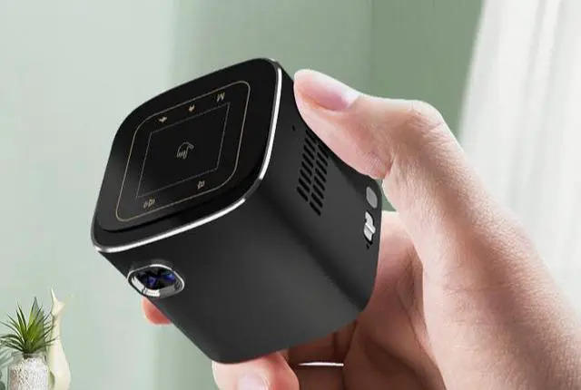 Alt view image 3 of 7 - Mini Projector with Android TV, DLP and Rechargeable Battery,  Pocket Portable Projector with WiFi Bluetooth, 360°Speaker, 1080P Support, Wireless Smart Outdoor Projector for Phone/HDMI/USB