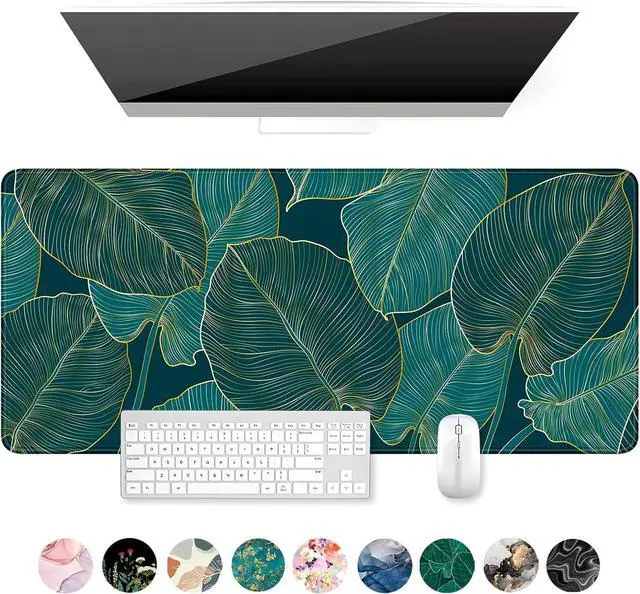 Main image of Auhoahsil Desk Mat, Ultra Large Mouse Pad, XXL Gaming Mousepad, Green Tropical Leaves Deskpad, Big Extended Full Size Mouse Pad, Desktop Desk Matt for Keyboard, Laptop & Computer, 35.5 x 15.7 in