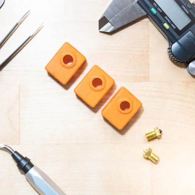 Alt view image 4 of 7 - Prusa Mini Mini+ Heat Block Orange Silicone Sock X by levendig | dsgn [3-Pack] - Insulate & Protect Your 3D Printer Hot End Nozzle | Custom Screw Holes | Prevent Damage