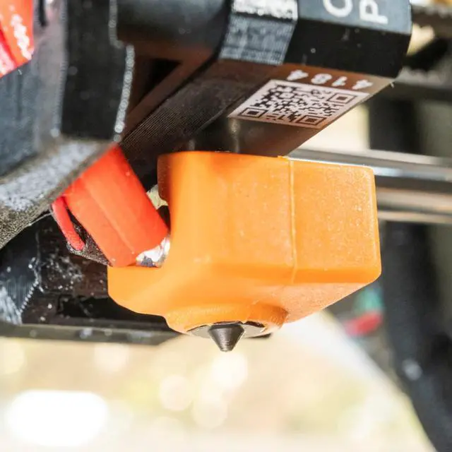 Alt view image 6 of 7 - Prusa Mini Mini+ Heat Block Orange Silicone Sock X by levendig | dsgn [3-Pack] - Insulate & Protect Your 3D Printer Hot End Nozzle | Custom Screw Holes | Prevent Damage