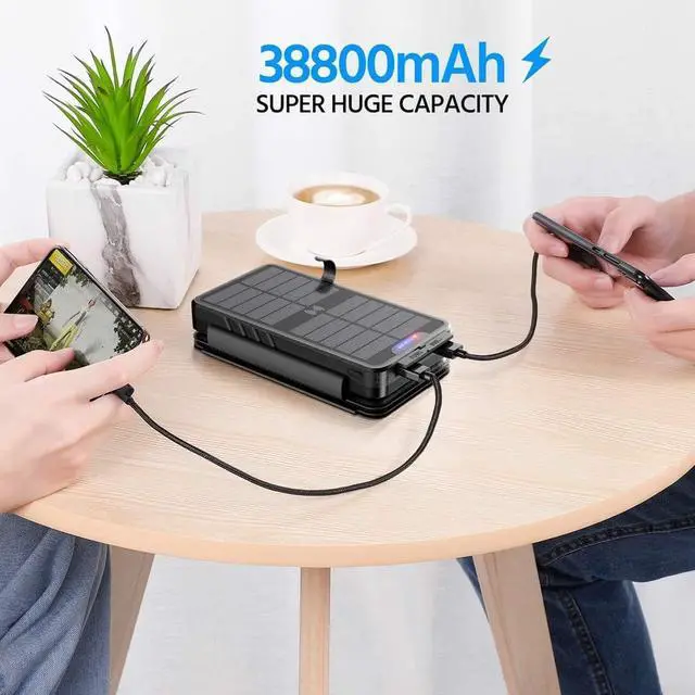 Alt view image 6 of 7 - Solar Charger 38800mAh Power Bank with Dual 5V3.1A Outputs 10W Qi Wireless Charger Waterproof Built-in Solar Panel and Bright Flashlights