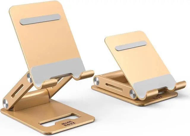 Main image of Minthouz Adjustable & Foldable Z-type Aluminum Mobile Phone Stand with Anti-Slip Base and Convenient Charging Port, Compatible with iPhone 16-11 series and more 4.7''-7.9'' Phones - Gold