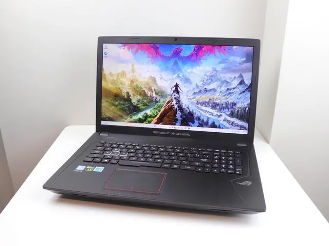 Main image of ASUS STRIX - 17.3" - Intel Core i7 7th Gen 7700HQ (2.80GHz) - NVIDIA GeForce GTX 1050 Ti - 16GB DDR4 - 256GB SSD + 1TB HDD - Full HD (1920x1080) - RGB keyboard - Windows 11 - Gaming Laptop