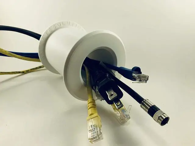 Main image of Wall Eye Wall Port 2" ID - 4 1/8" - 6 5/8" Wall or Barrier Thickness Range - Allows The Running of Cable, Cords, Wires, etc. from one Side of a Wall or Barrier to The Other.