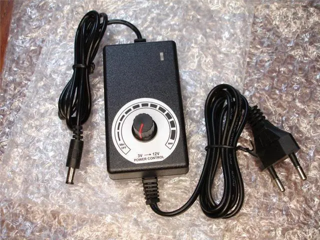 Alt view image 2 of 6 - Adjustable AC to DC 3-12V Universal Adapter 100-220V Voltage Regulated Power Supply Adatpor for CCTV Camera LED light strip (US plug)