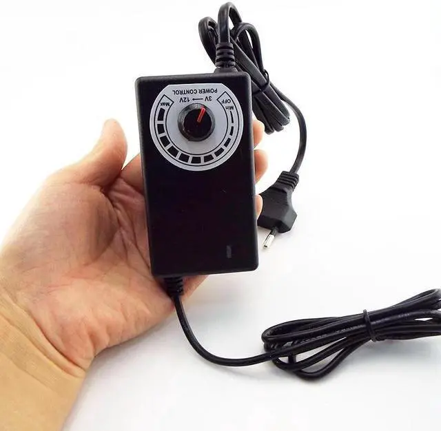 Alt view image 4 of 6 - Universal Adjustable CCTV Power Supply Adapter AC 100-240V to DC 3-12V 3A 36W Charger 5.5x2.1mm Jack Plug DC Female Connector L (US plug)