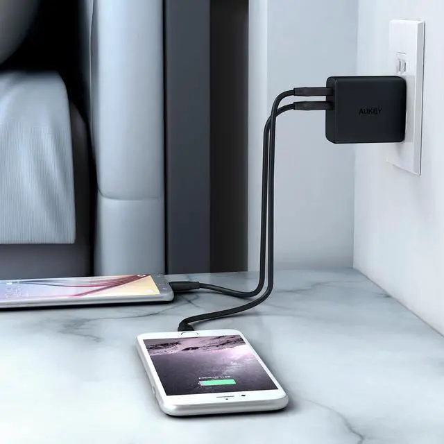 Alt view image 6 of 7 - AUKEY Wall Charger Ultra Compact Dual Port 4.8A Output Fast Charging Foldable Plug USB Charger PA-U42