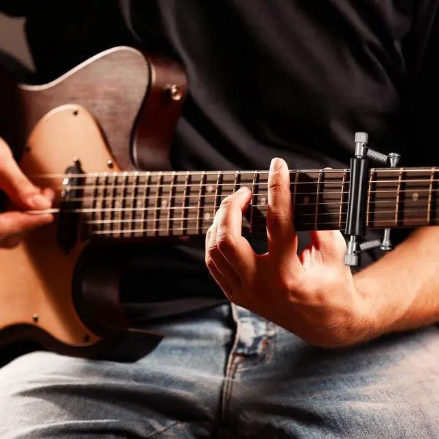 Alt view image 7 of 7 - Acaigel 2 Pcs Guitar Rolling Capo Sliding Adjustable Capo Rubber and Stainless Steel Capo