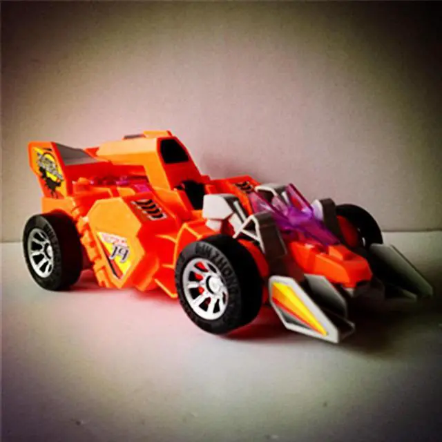 Alt view image 4 of 5 - Electric Transforming T-Rex Dinosaur LED Car with Light Sound Diecast Model Toy