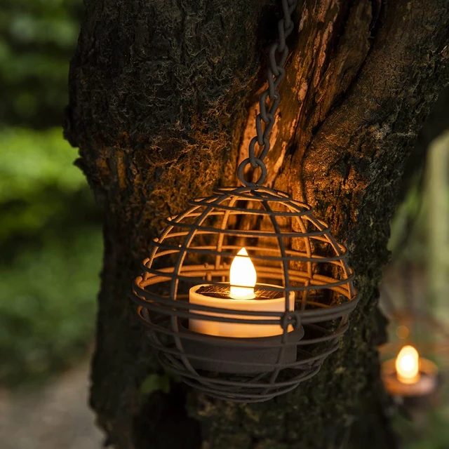 Alt view image 2 of 7 - Solar Hanging Lanterns Outdoor Waterproof, Rust Iron Ball Candle Holder with Flickering Solar Powered Tea Lights, Perfect Chargeable Solar Lights for Backyard Patio Garden Fence Tree Decoration-4Pack
