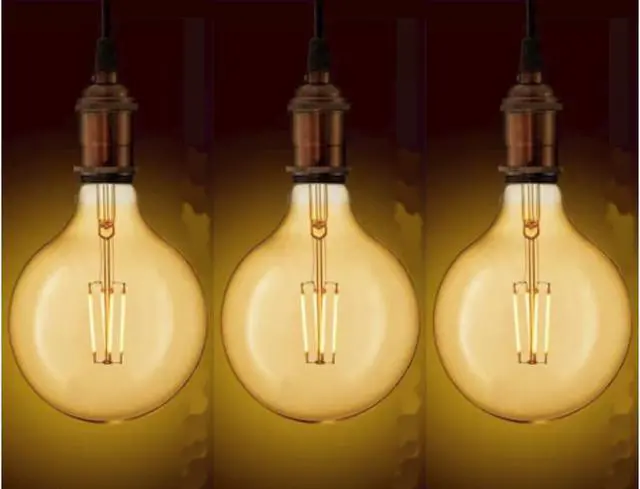 Alt view image 5 of 6 - (case of 3 bulbs) GE Lighting 48631 Vintage LED G40 Light Bulb, Warm Candlelight, Amber Glass, 60 watt equivalent using only 5.5 watts, 400 lumens, Dimmable, Vintage Style LED Light Bulb