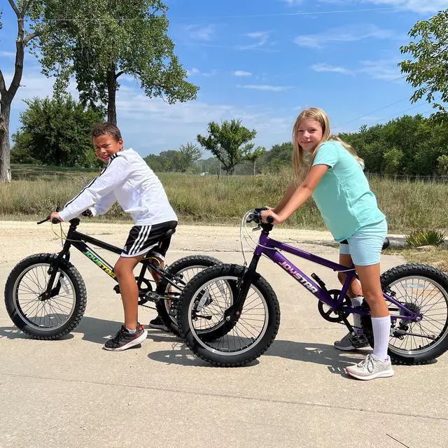 Alt view image 2 of 7 - JOYSTAR 20 Inch Mountain Bike for Kids Ages 7-13, 7 Speed Disc Brakes MTB, Fat Tire Kids Bicycles for Boys Girls, Black