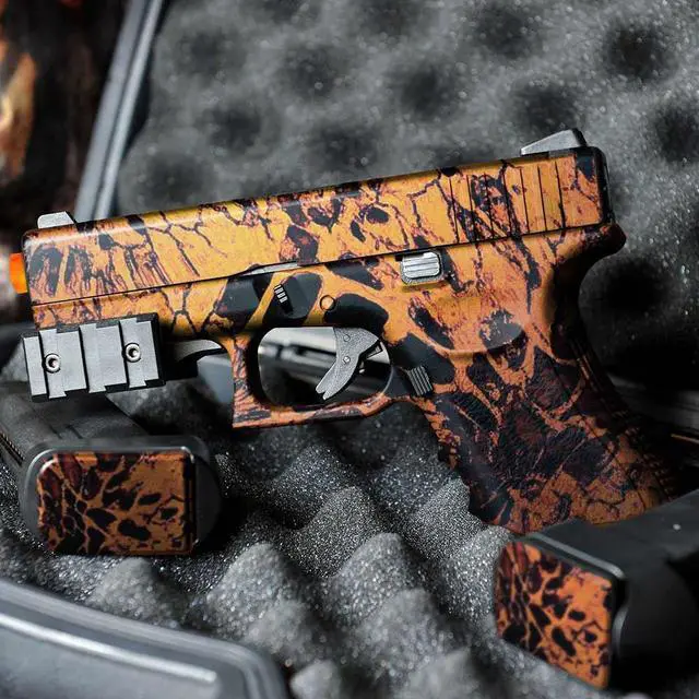 Alt view image 2 of 4 - GunSkins Pistol Skin for Airsoft Glock 19 (Prym1 Fire Storm)