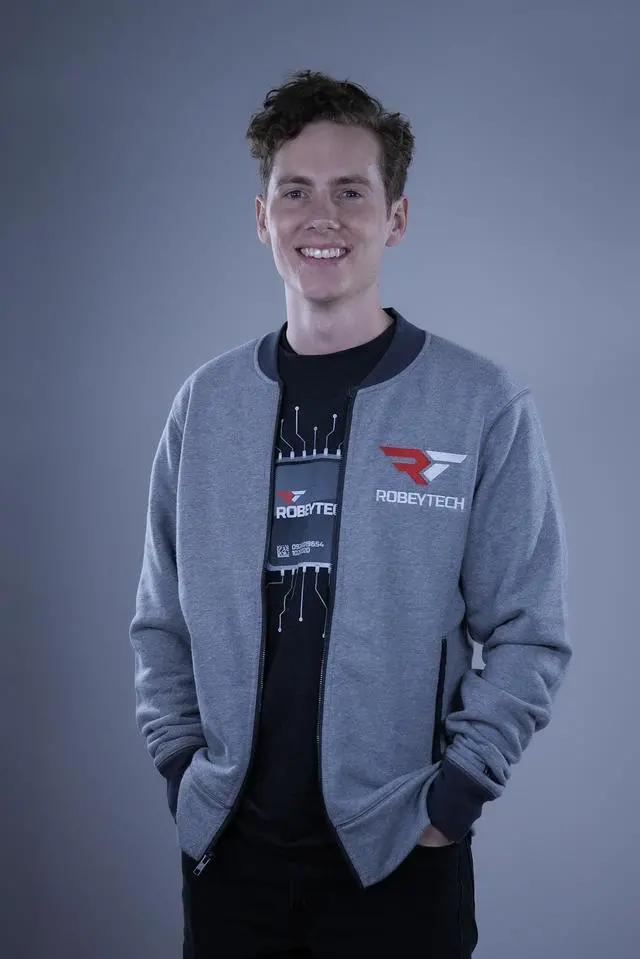 Alt view image 2 of 4 - The Premier Robeytech Logo on a New Era French Terry Baseball Full-Zip jacket in Light Graphite Twist. The perfect combination for our first jacket.