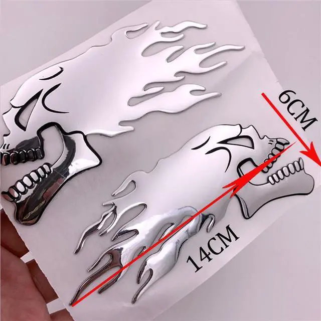 Alt view image 3 of 5 - Yassdwbn 6x14cm Pair Skull Head Flame Style Motorcycle Fuel Gas Tank Fairing Badge Decal
