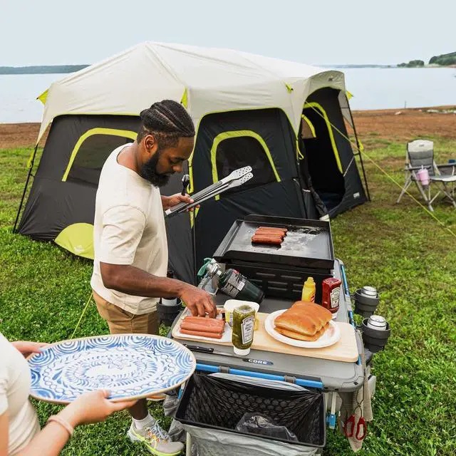 Alt view image 4 of 7 - CORE Outdoor Cook Table | 4 Foot Table with Adjustable Height and Storage for Cooking Accessories | Foldable & Portable for Beach, Picnic, Backyards, BBQ, Tailgate, Patio and Party