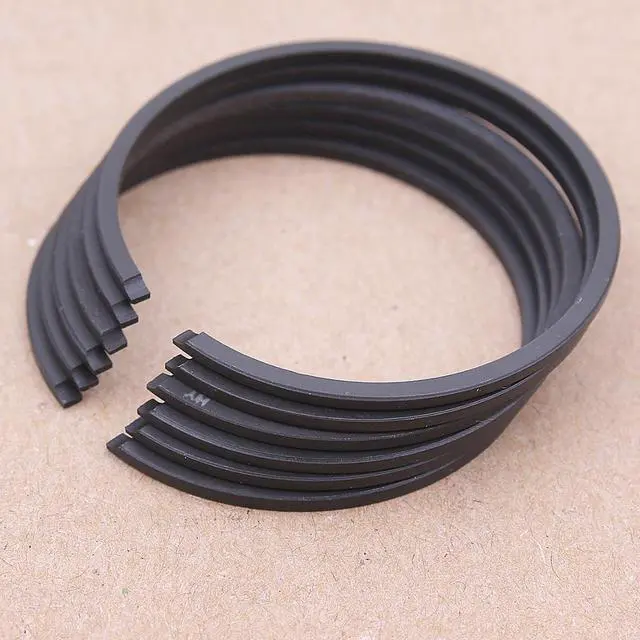 Alt view image 3 of 3 - 6PCS 50mm x 15mm Piston Ring For Husqvarna 61 266 268 272 365 372 371 362 Jonsered 2063 625 670 2071 Chainsaw Replacement part