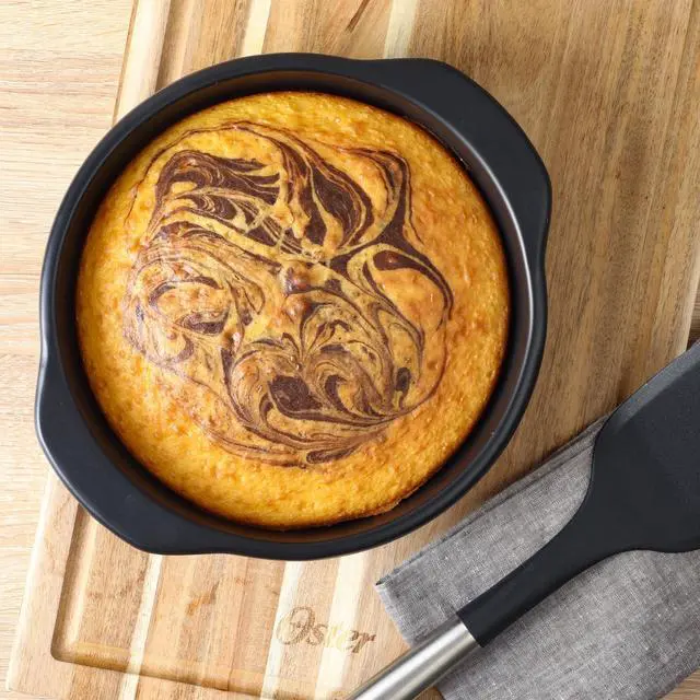 Alt view image 4 of 4 - Oster Teston Platinum Collection 9 Inch Nonstick Carbon Steel Cake Pan in Matte Black