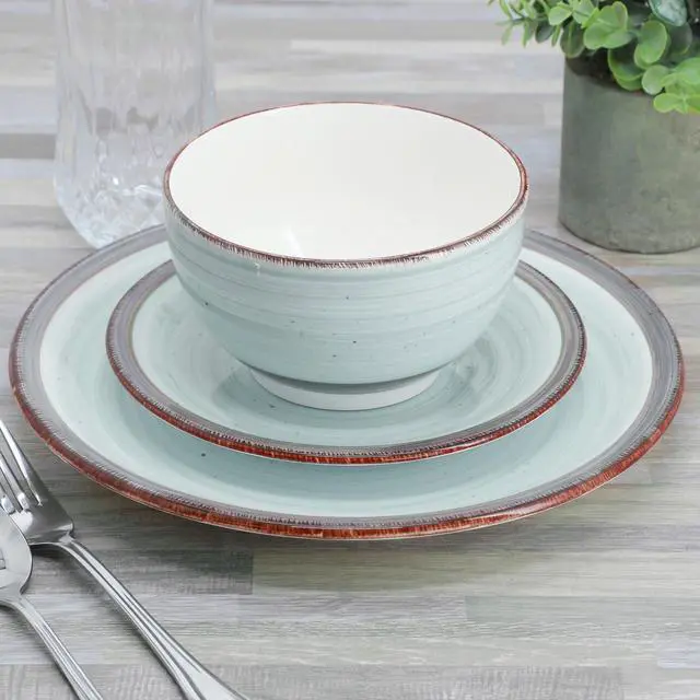 Alt view image 7 of 7 - Gibson Home Holcomb 12 Piece Ceramic Dinnerware Set in Light Blue