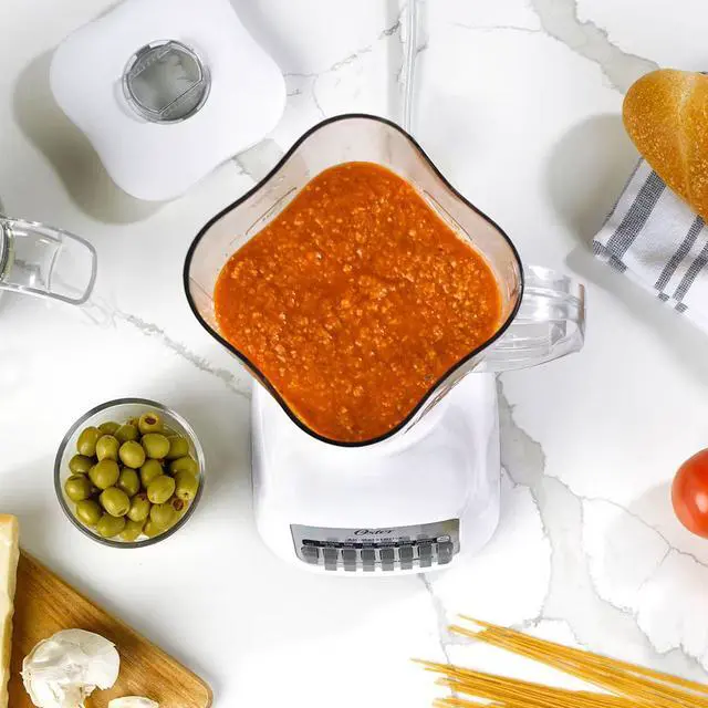 Alt view image 4 of 4 - Oster Classic 700 Watt 2-in-1 Kitchen System Blender and Food Chopper in White