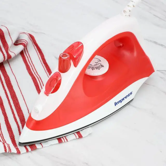 Alt view image 5 of 5 - Impress 1200 Watt Compact & Lightweight Steam & Dry Iron in Red