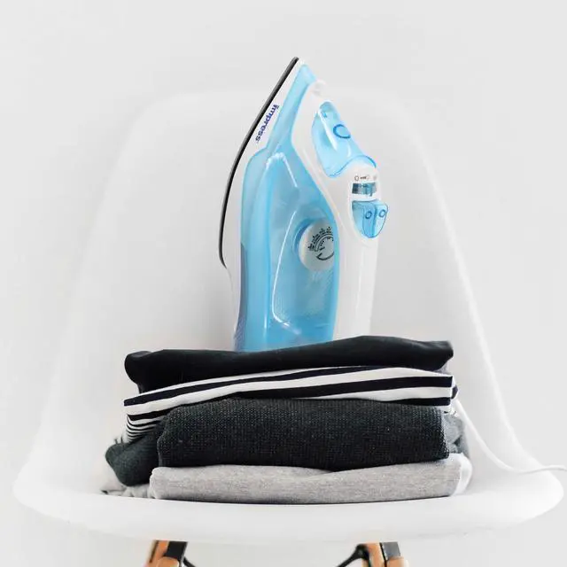 Alt view image 5 of 5 - Impress Mid-Sized Spray Steam and Dry Iron in Blue with Nonstick Soleplate