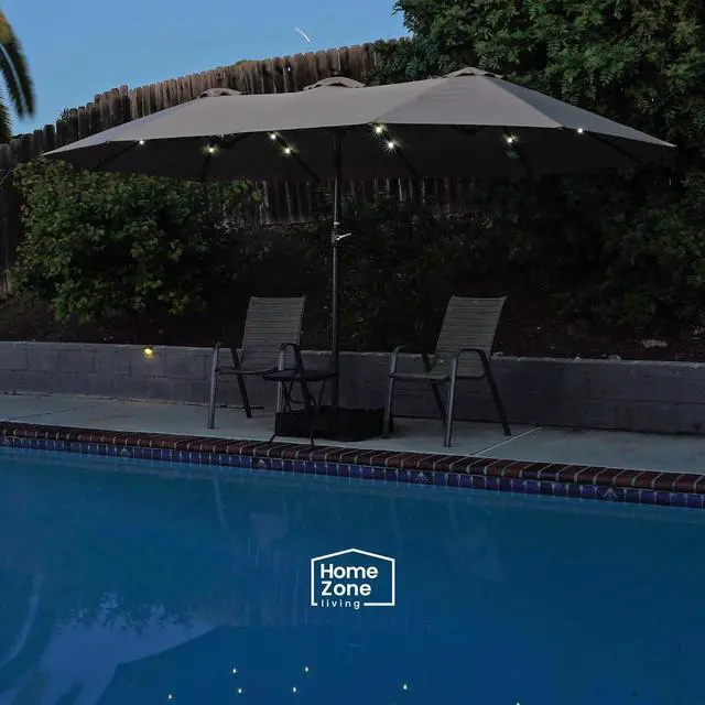 Alt view image 6 of 7 - Home Zone Living 15x9 Ft Double Head Patio Umbrella with Base, 36 LED Lights, Sand Bags, UV Resistant & Waterproof, 213 LBS Total Weight, Beige Tan