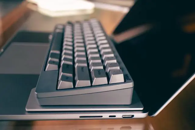 Alt view image 4 of 5 - Aluminum Keyboard Bridge for Mechanical Keyboards + Laptops : Laptop Keyboard Cover For External Keyboards: Made for Apple MacBook Pro - Digital Nomad : Travel Accessory - Keyboard Riser - Meteor Gray