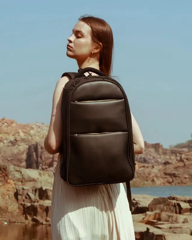 Alt view image 5 of 5 - RASHKI Aero - 15.6" Overnighter Laptop Backpack | Travel & Office Bag | USB Port, Rain Cover & 36L Vegan Leather (Black)