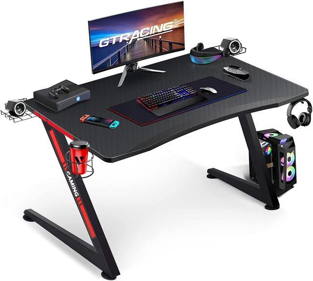 Gaming Desk,Gaming Table with Storage,Ergonomic Z-Shaped Carbon Fiber  Surface Gaming Table with Cup Holder,Speaker Holders and Headphone Hook( Black) 
