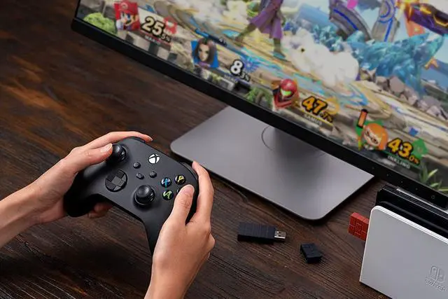 Alt view image 6 of 7 - 8BitDo Wireless USB Adapter 2 for Switch/Switch 2, Windows PC, Mac & Raspberry Pi, Compatible with Xbox Series X & S Controller, Xbox One Bluetooth Controller, Switch Pro and PS5 Controller (Brown)